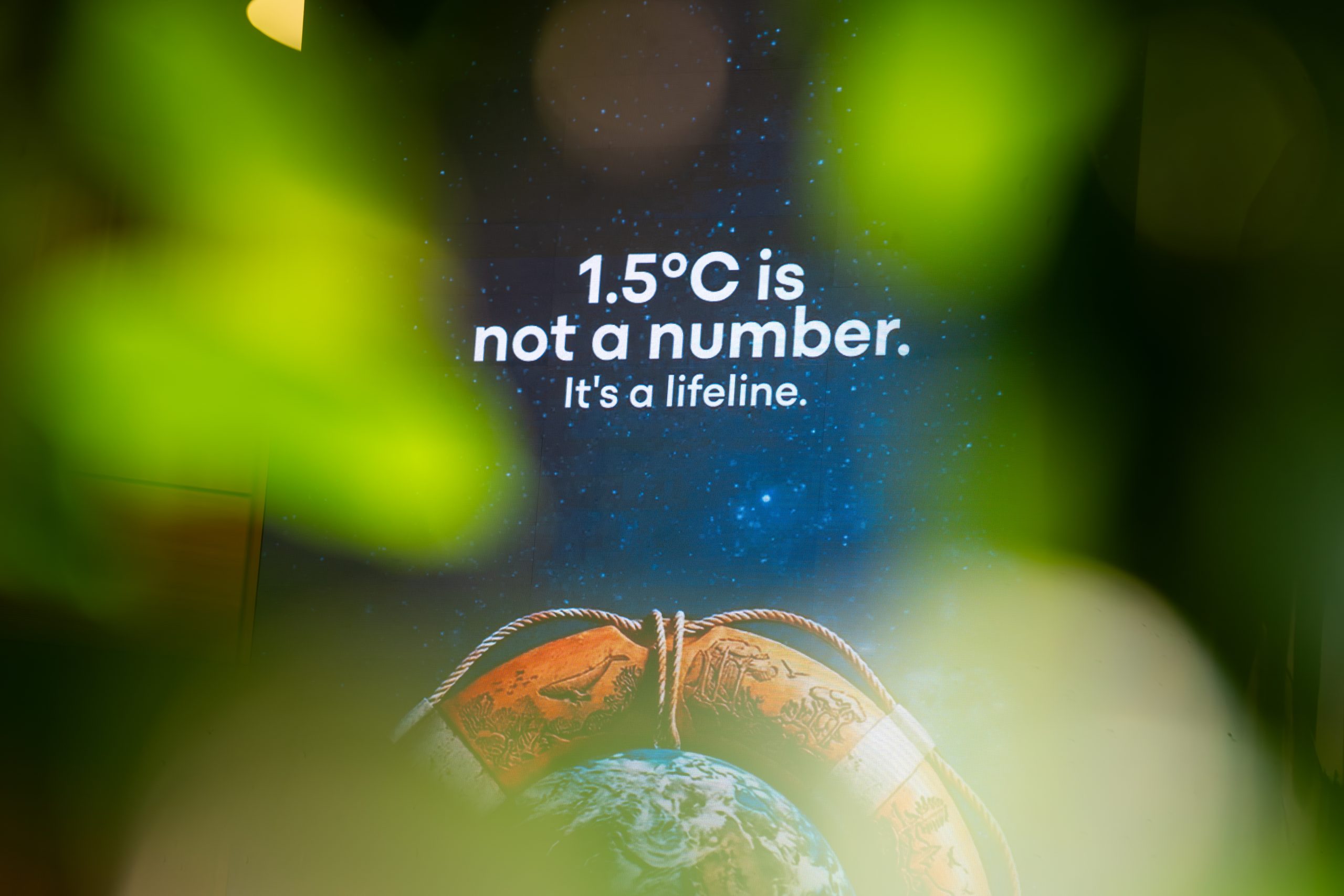 A sign saying '1.5C is not a number. It's a lifeline'