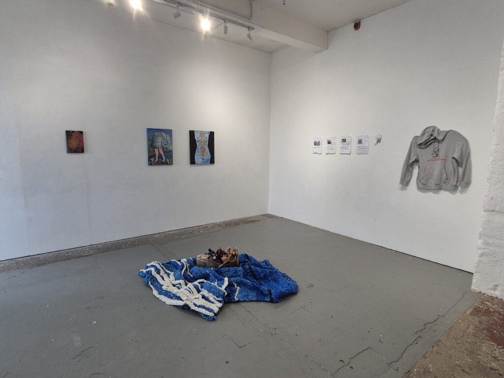 An art gallery with a piece around sea crossings in the centre