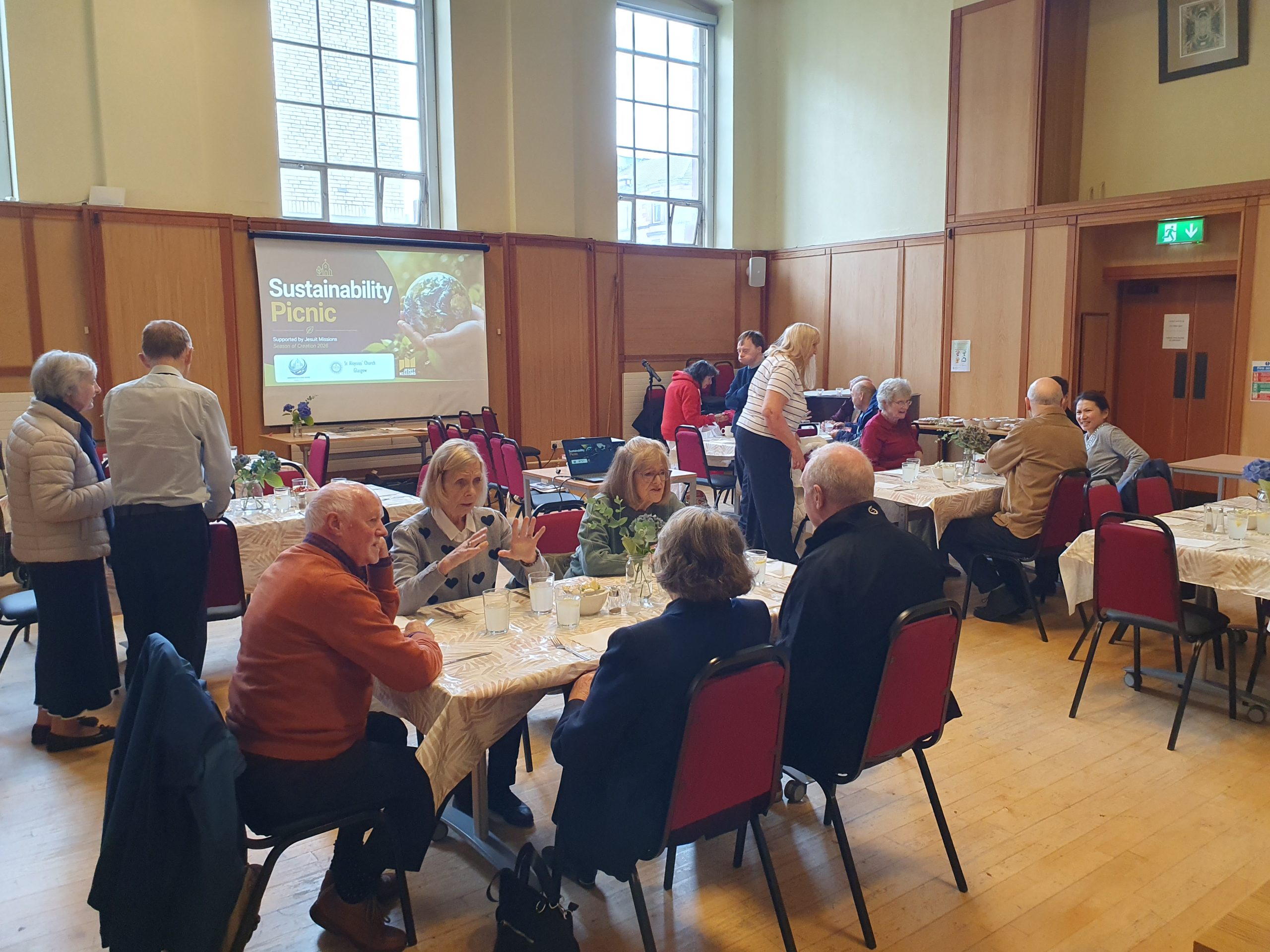 People gathered in a parish hall